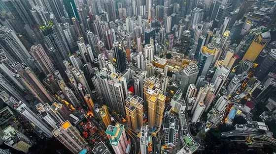穷人地狱，富人天堂，香港地产商是如何“摘瓜“的？