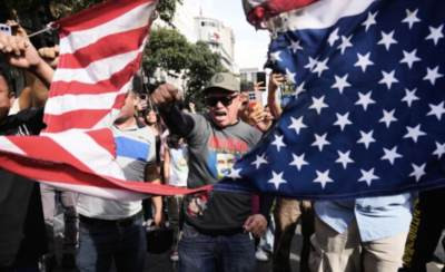 美国军事入侵委内瑞拉并绑架其总统马杜罗的行为，是特朗普政府“新门罗主义”的实践，是一种以低成本实现政权更迭的“混合战争”。该行动严重违反国际法，侵犯主权，标志着国际秩序正加速回归以权力为主导的现实主义逻辑，世界已处于一种“准战争”状态，联合国等国际规则的约束力被进一步削弱。